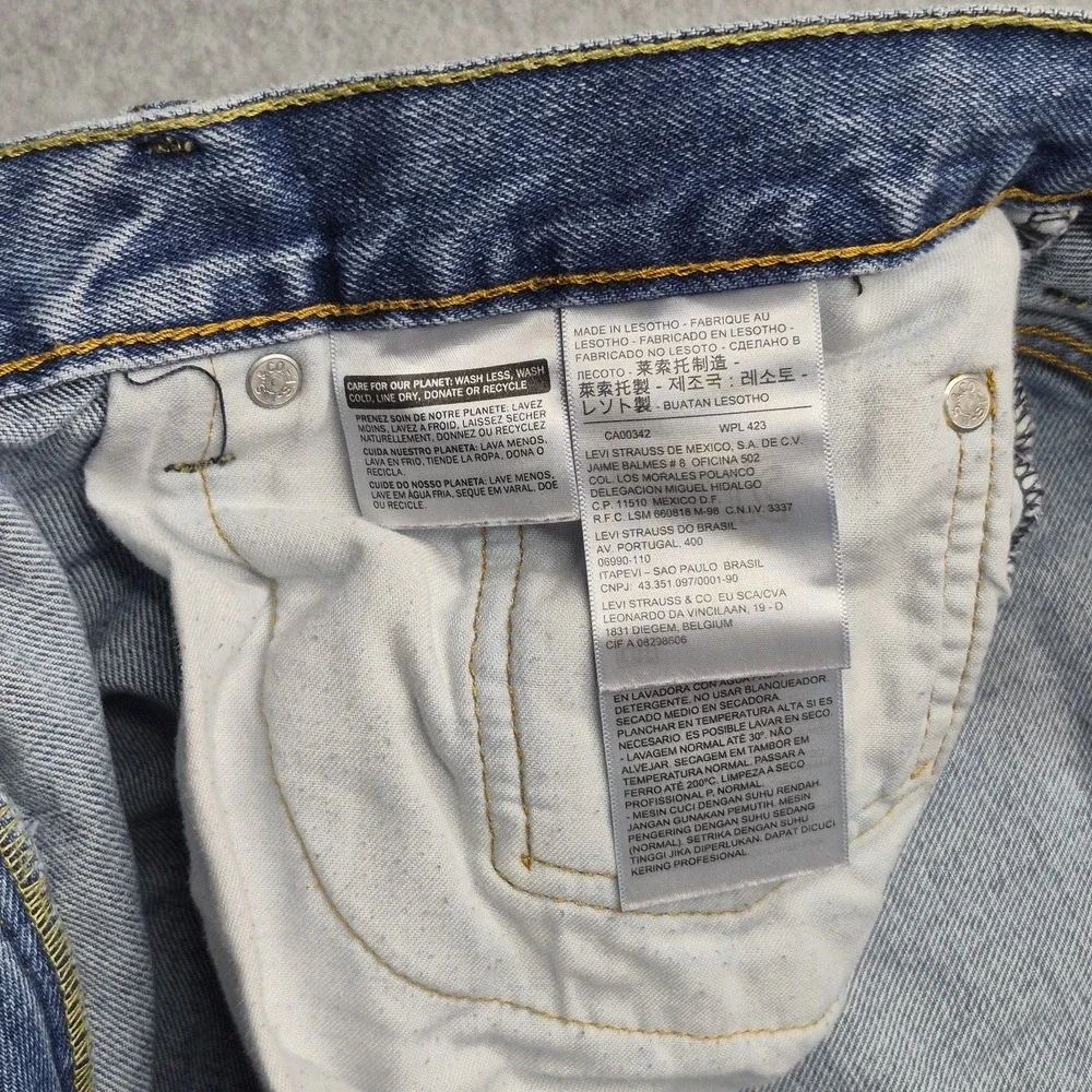 Levi's 560 Jeans Mens 38x34 Comfort Fit Tapered Medium Wash Blue Denim